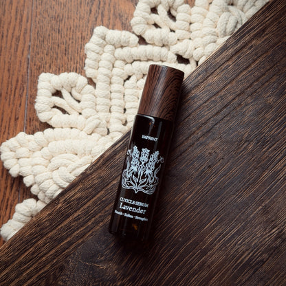 Dark brown bottle with white label on a wooden surface